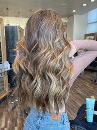 the back of a woman's hair in a salon