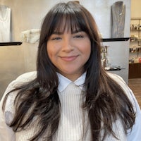 a woman with long hair in a salon