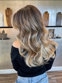 the back of a woman's hair in a salon