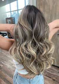 the back of a woman's hair in a salon