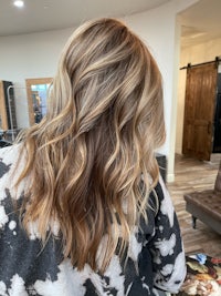 the back of a woman's hair in a salon